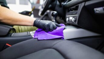 removing odors from automobiles